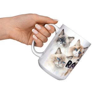 Love_Ragdoll_15_Oz_White_Coffee_Mug_15ozWhiteMugLifestyleLHRaisedAngle_Mockup.png