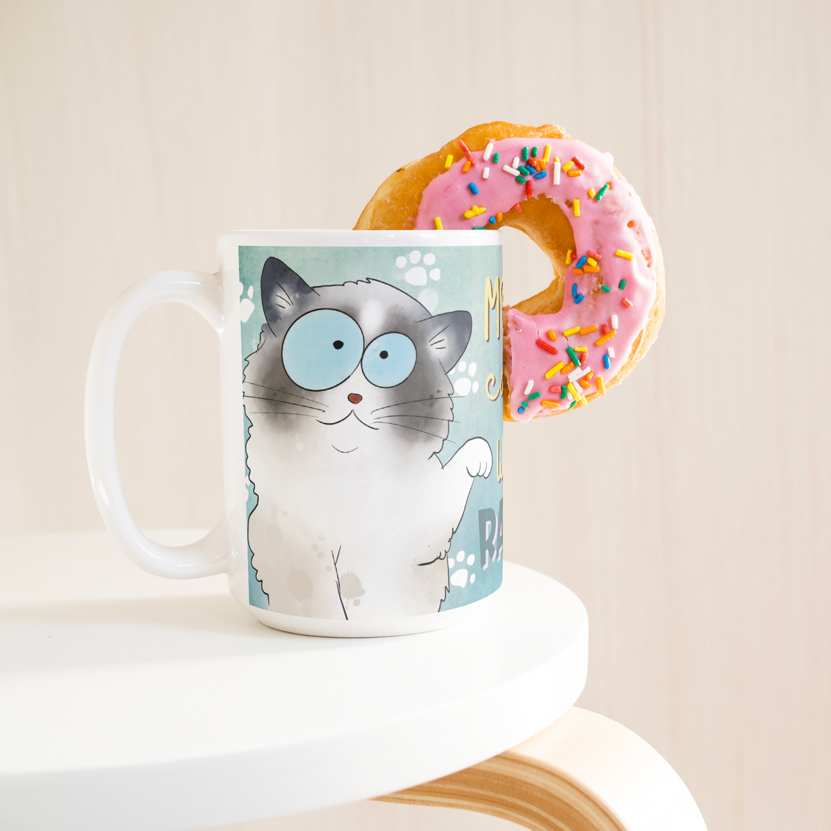 Morning_Coffee_With_My_Ragdoll_15ozWhiteMugLifetsyleDonutLH_Mockup.png